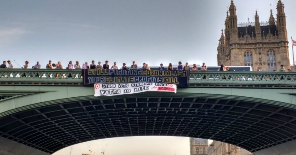 Banner against DAPL on Westminster Bridge over the River Thames -Tuesday 13th September