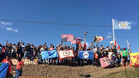 Protestors against the DAPL on the banks of the Cannonball River